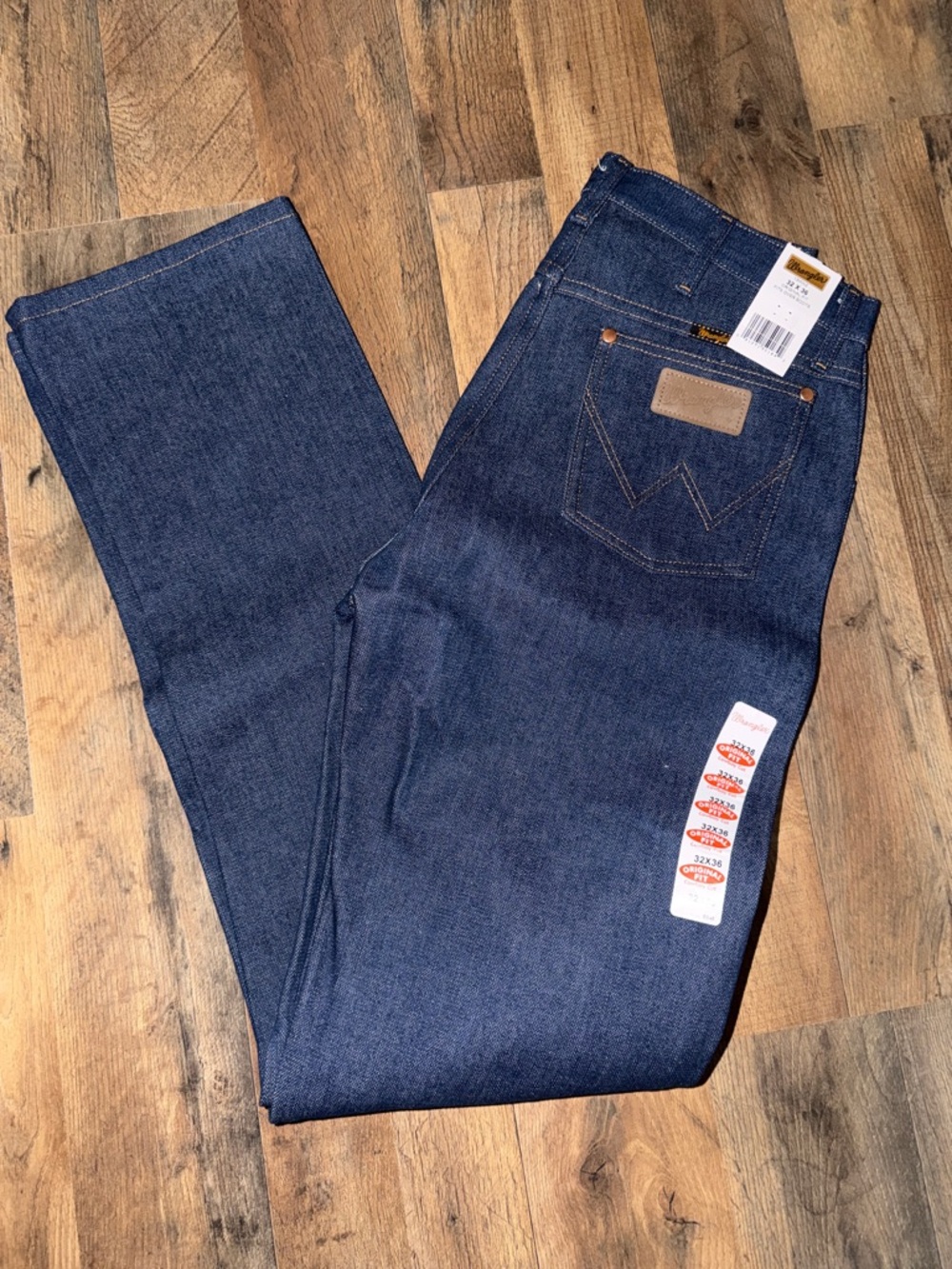 Wrangler Men's Straight Jeans in Indigo Blue with Tan Patch 32 x 36